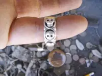 5 skull ring.webp