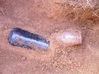 DIV 16 bottles in hole.webp