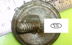 Button Mil Cleaned Writing.webp