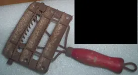 horse curry comb old.webp