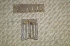 next to harmonica reed.webp