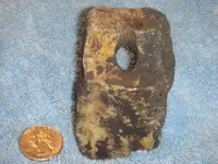 stone with hole.webp