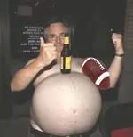 Drunk Beer belly fat guy with beer bottle and football.webp
