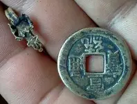 july 6th strange coin and a ring.webp
