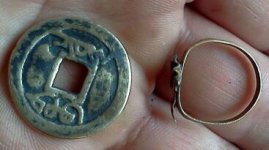 july 6th strange coin other side and ring.jpg