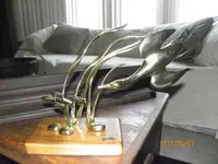 Bijan brass sculpture.webp
