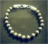 aug silver bracelet.webp