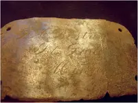 aug brass inscribed name plate.webp