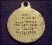 aug vintage dog ID tag.webp