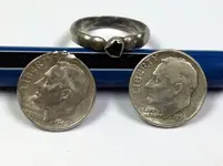 Two_Rosies_and_a_ring.webp