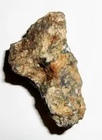 Very light weight metallic rock found.webp