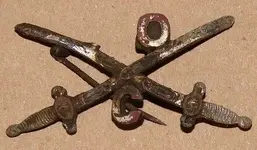 What Is It Crossed Swords Pin Cropped (421x246).webp