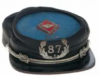 Fraternal kepi Illionois 87 with lily (700x538) (700x538).webp