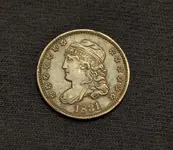 Capped Obverse.webp