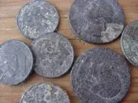 coins beach silver.webp