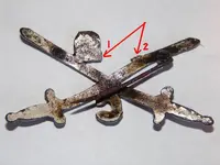 What_Is_It_Swords_Pin_Back_Side_paint.webp