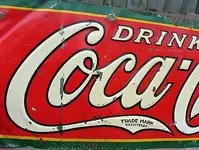 Coca Cola Sign with Trade Mark on Tail (440x333).webp