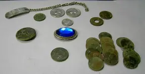 Bracelet and other coins.webp