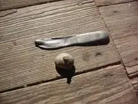 silver wad and knife.webp