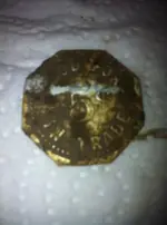 Face 5 cent token.webp