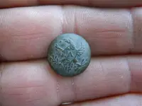 Eagle A button.webp