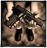 Kid+Holding+Gun.webp