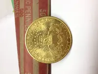$20 gold back.webp