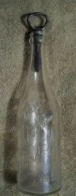 Murdock and Freeman 1895 Bottle with 1894 Opener Inserted 001 (274x700).webp