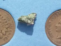 Green Crystal in Granite 011.webp