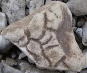 rock carving small.webp