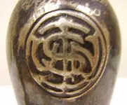 silverplated-wardroom-officers-candlesticks-insignia-closup usn logo.webp