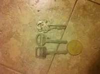 Keys and drachma.webp