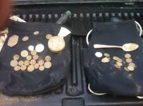 coins on pouches.webp