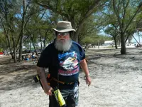 Bill metal detecting a beach.webp