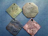 slave-hire-tags-of-Charleston_photobyBH-of-Fakebusters.webp