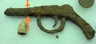 What Is It Pistol Rusted Civil War Era Painted with Green Arrowa.webp