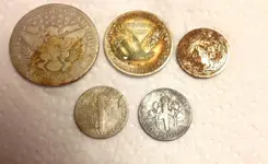 May 9, 2012 5 Silvers including 3 coin pocket spill clean rev.webp