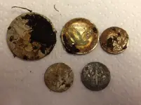 May 9, 2012 5 Silvers including 3 coin pocket spill dirty rev resized.webp