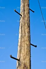 depositphotos_5677056-Old-telephone-pole-with-rungs-for-climbing.webp