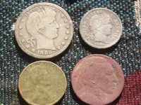 four coins front.webp