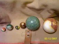 sheres with marbles.webp