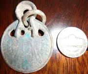 badgewithnickel.webp