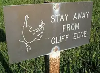 cliff-warning-sign-bylaws-law-signs.webp
