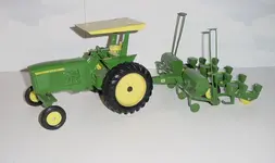 JD 4010 Rops & 494 Planter.webp