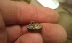 10-27-12buttonback.webp