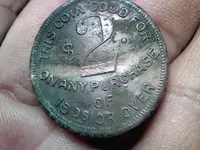 $2 Castleberg's Confidental credit token front.webp