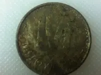 other side of token or coing.webp