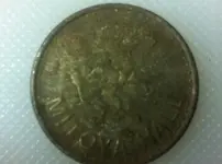 one side of coin or token.webp