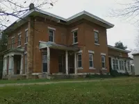 Old brick home.webp