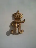 insignia_unknown_Pi-with-German-crown_TN_2012.webp